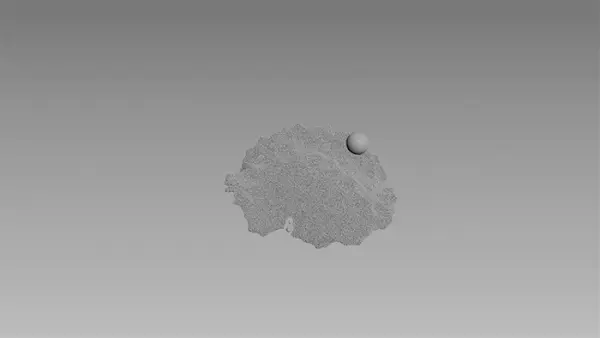 Clear water droplets scattered across a smooth grey surface.